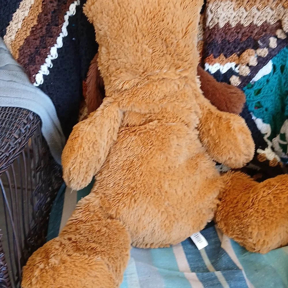 Big Fluff Soft Plush Dog Toy with Red Bow